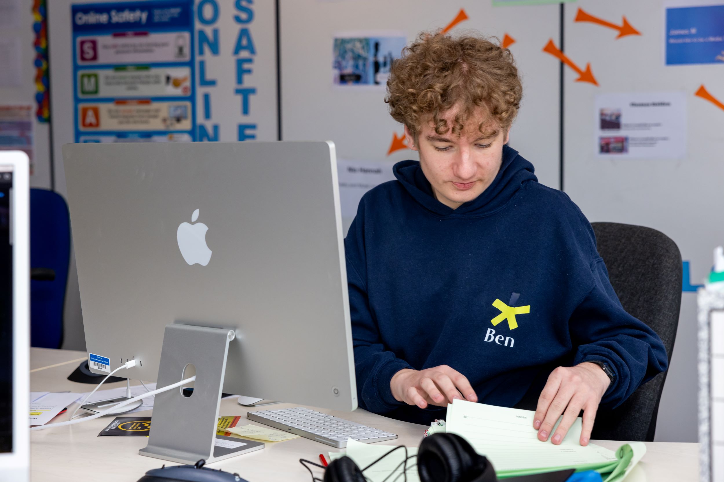 A Creative Media student working on an Apple Mac in the Karten Centre 