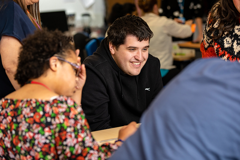 Students and staff chat