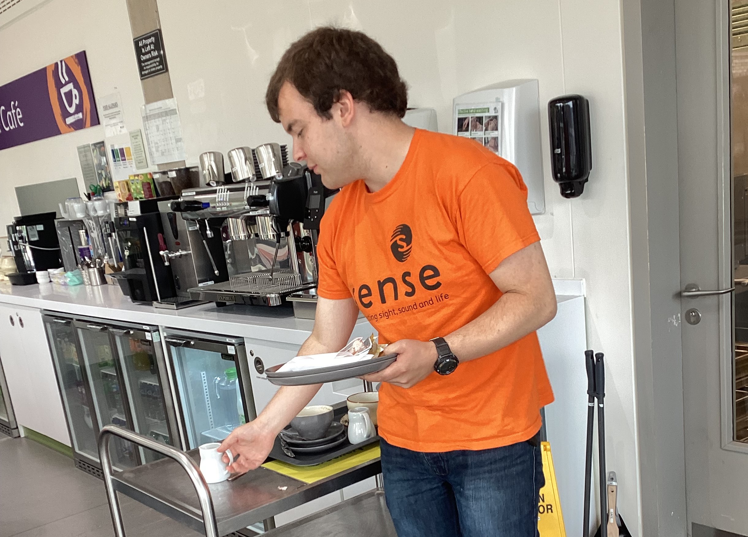 Image of Charlie working in the café