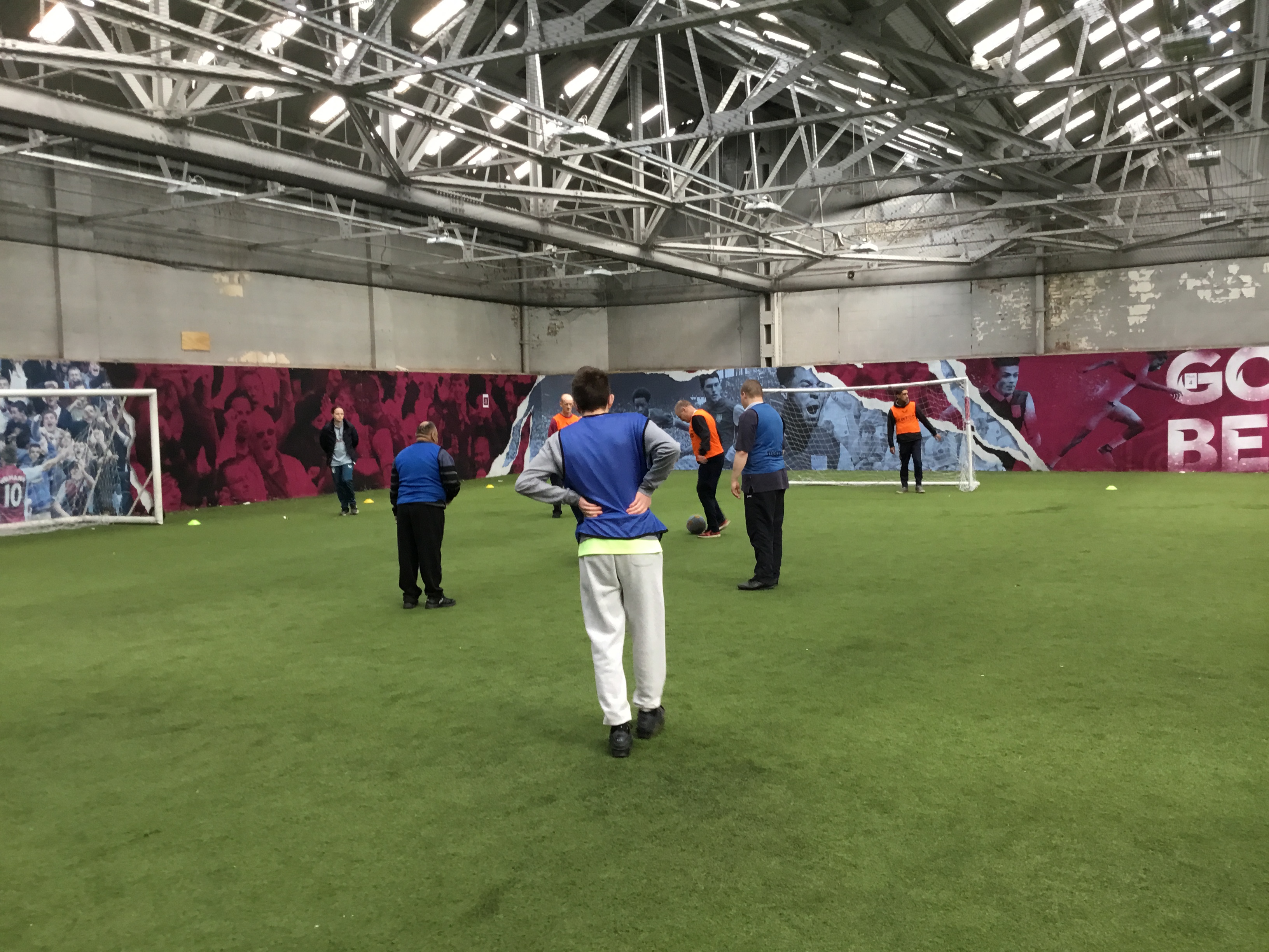 Sport students playing football 