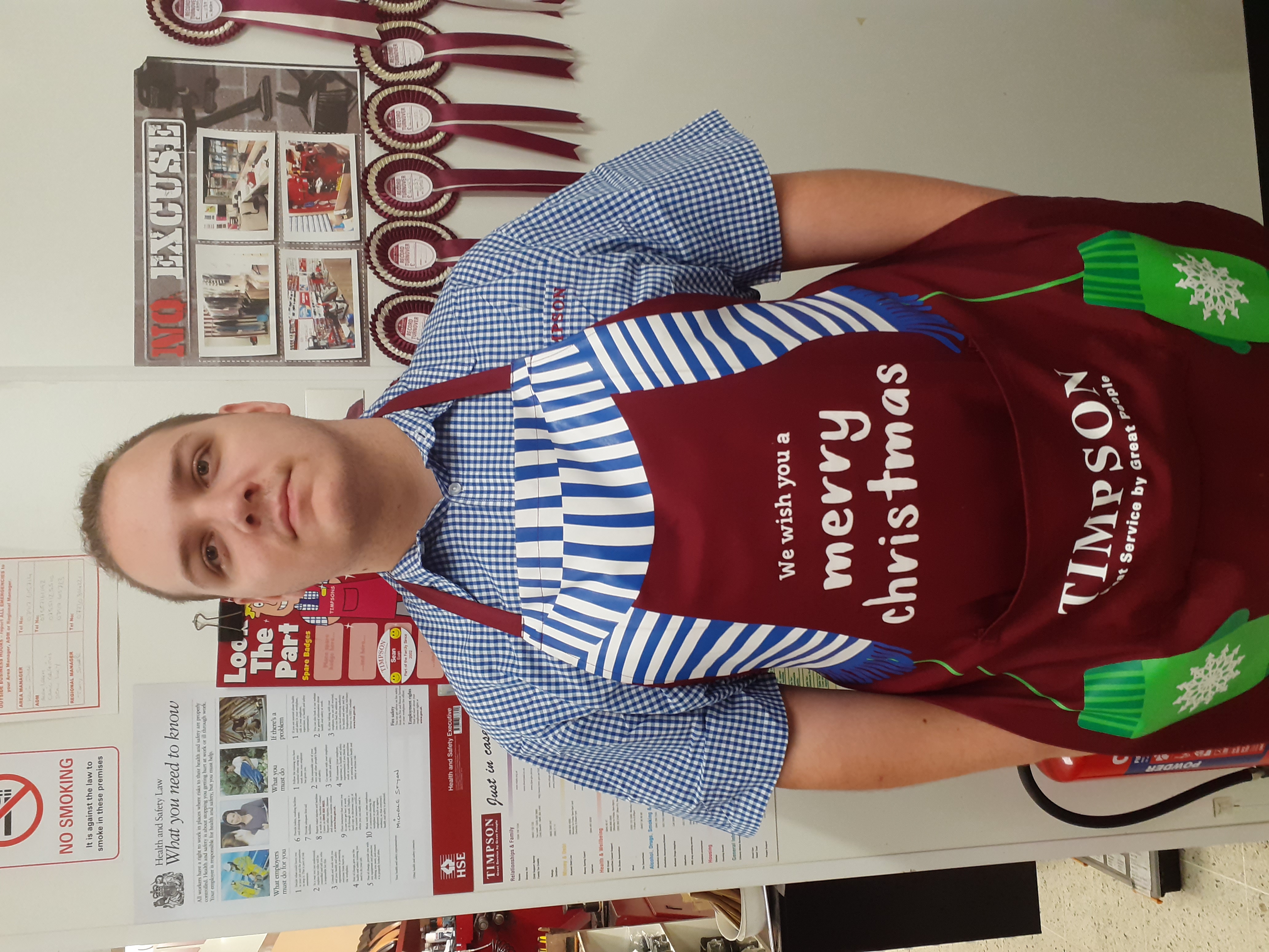 Image of Leighton in his Timpson's uniform 