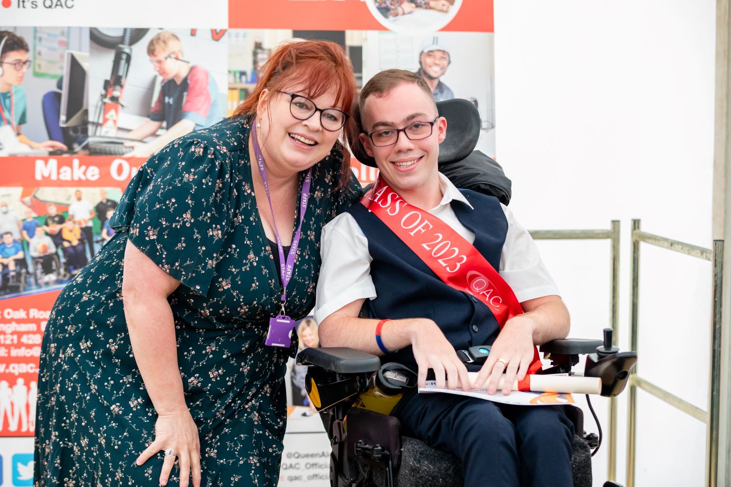 QAC student receives a certificate from Bev Jessop, College Principal 