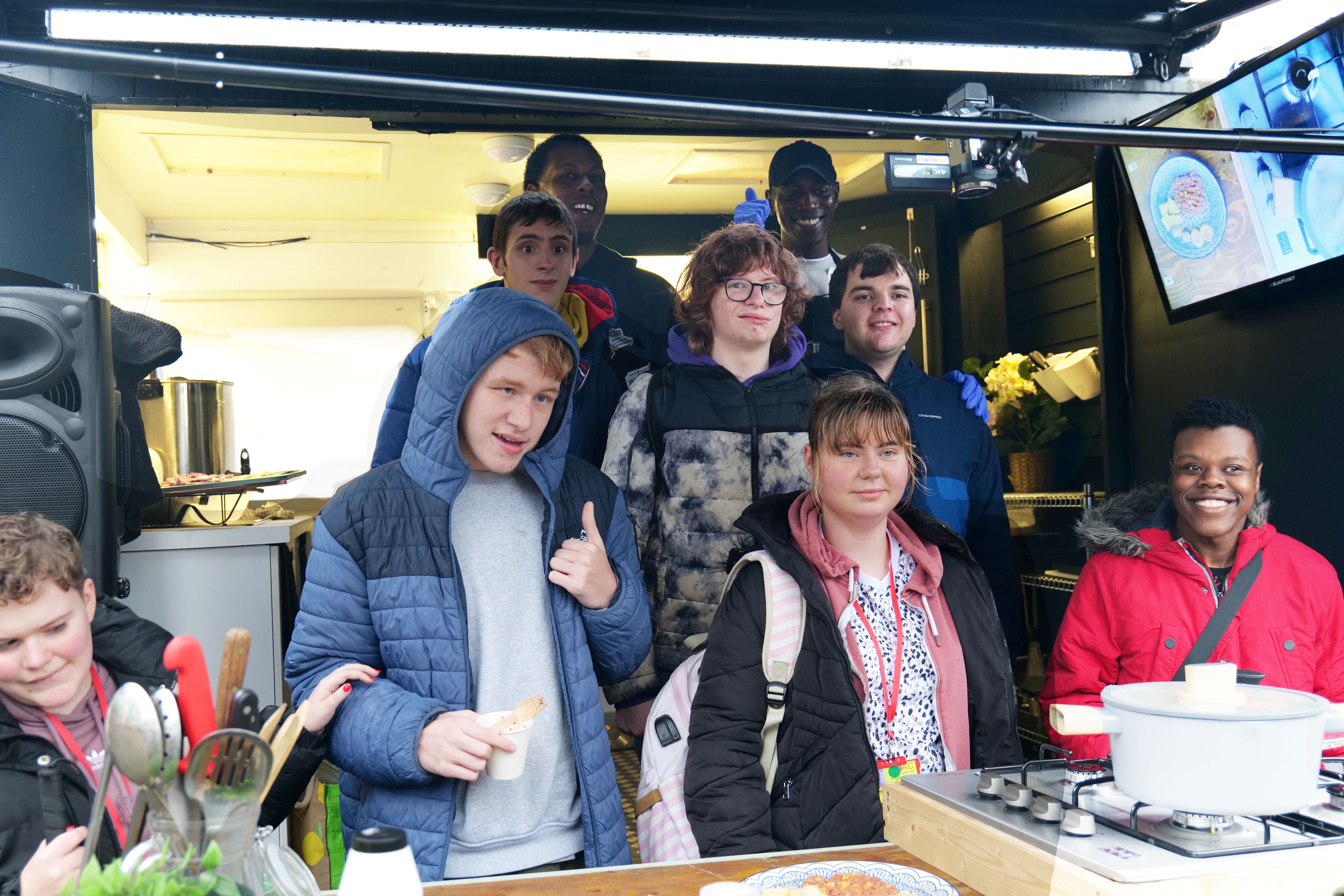 Hospitality students and Harrow Soup Kitchen staff in the demo kitchen