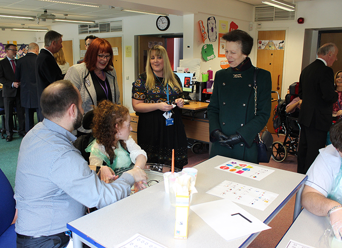 HRH The Princess Royal speaking to a student during her visit to PFL Black's classroom