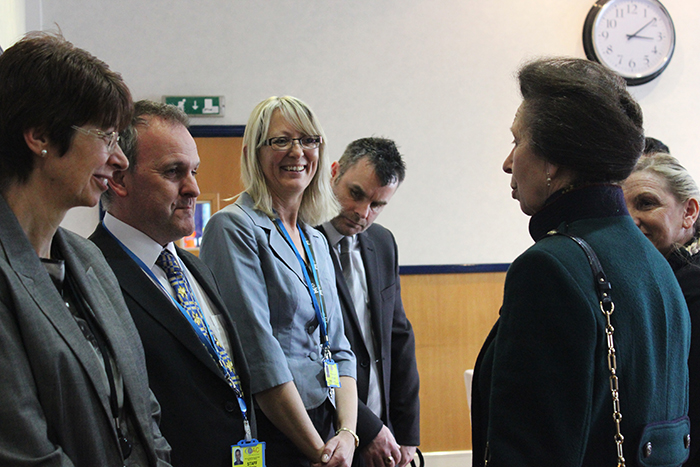 HRH The Princess Royal speaking with some of QAC's long serving members of staff