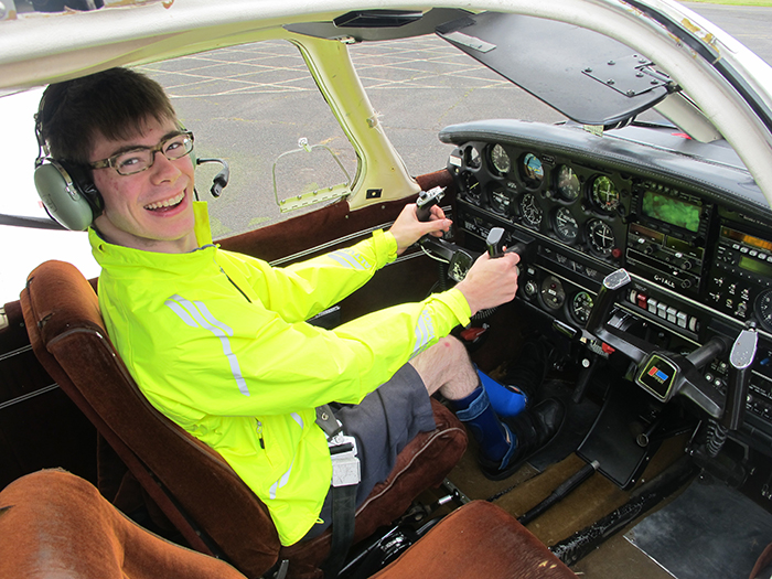 Bobby behind the controls of the plane, before his flying lesson.