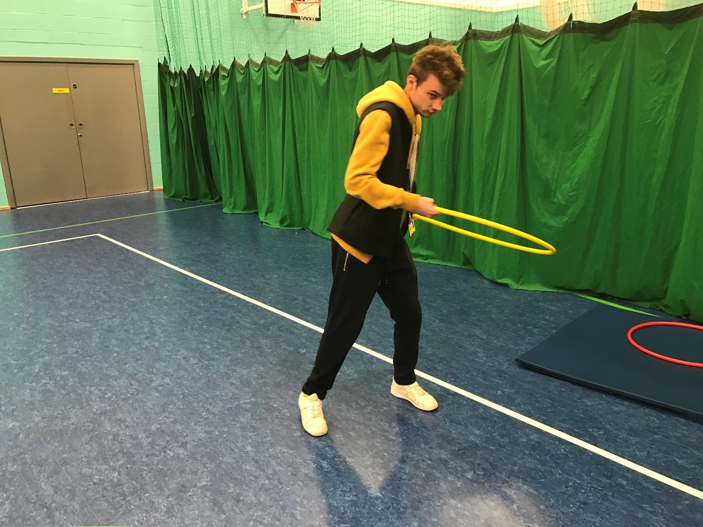 Image of James using a hula hoop