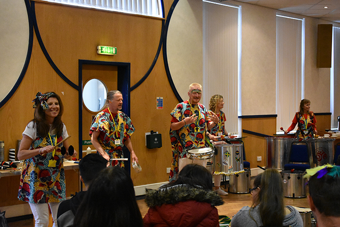 The Oya Batucada samba band giving a samba music demo to students