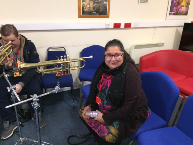 QAC student getting ready to play a piece of specially adapted music equipment