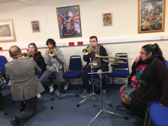 QAC Students using specially adapted music equipment