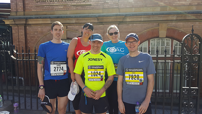 Team QAC runners all posing for a photo before the Great Birmingham Run