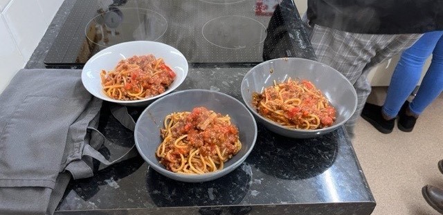 3 completed bowls of Spaghetti Bolognese