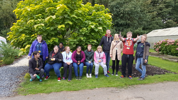 Student group at Umberslade Nurseries posing for a photo