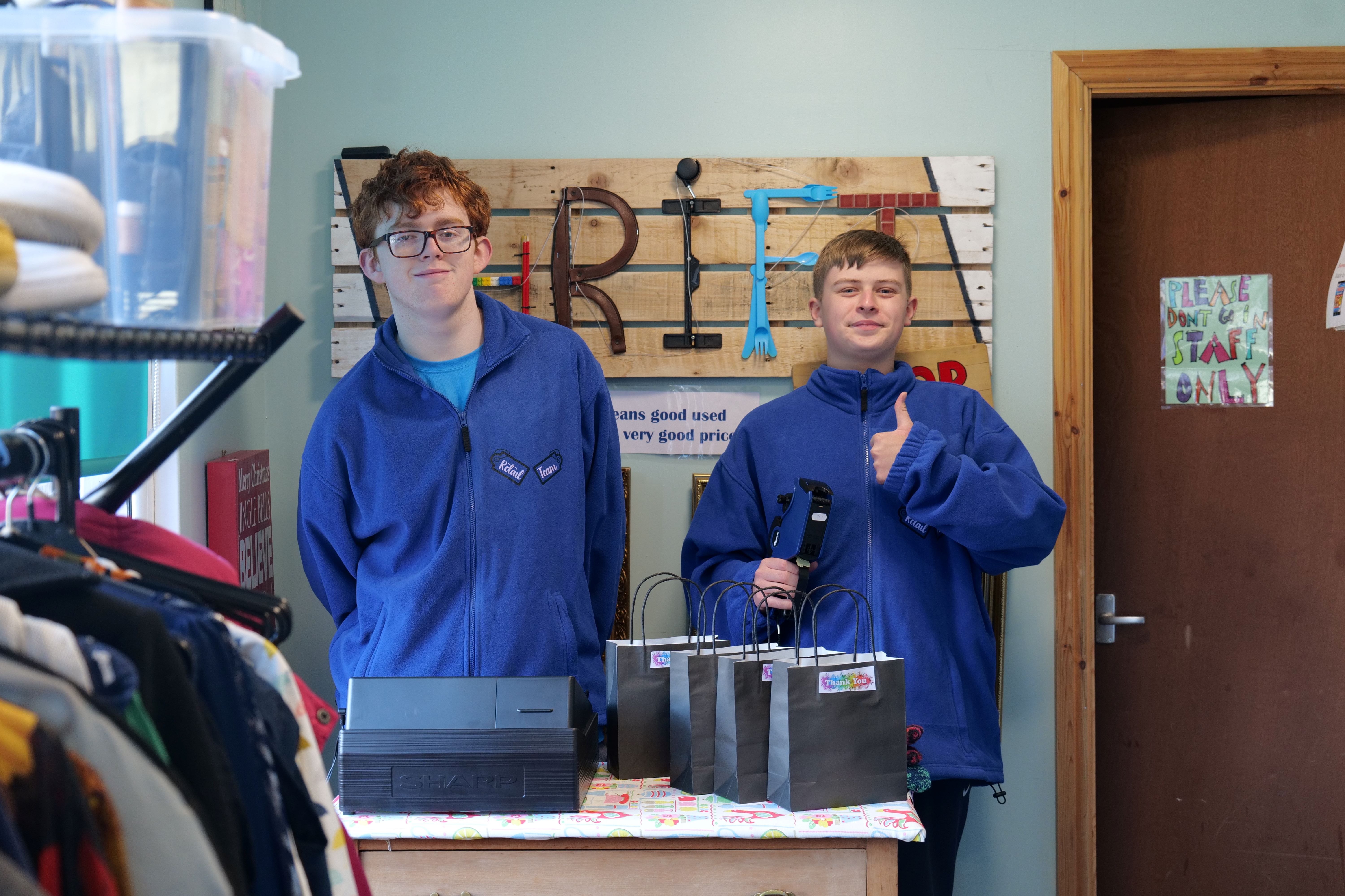 Two Step up blue students working in the shop