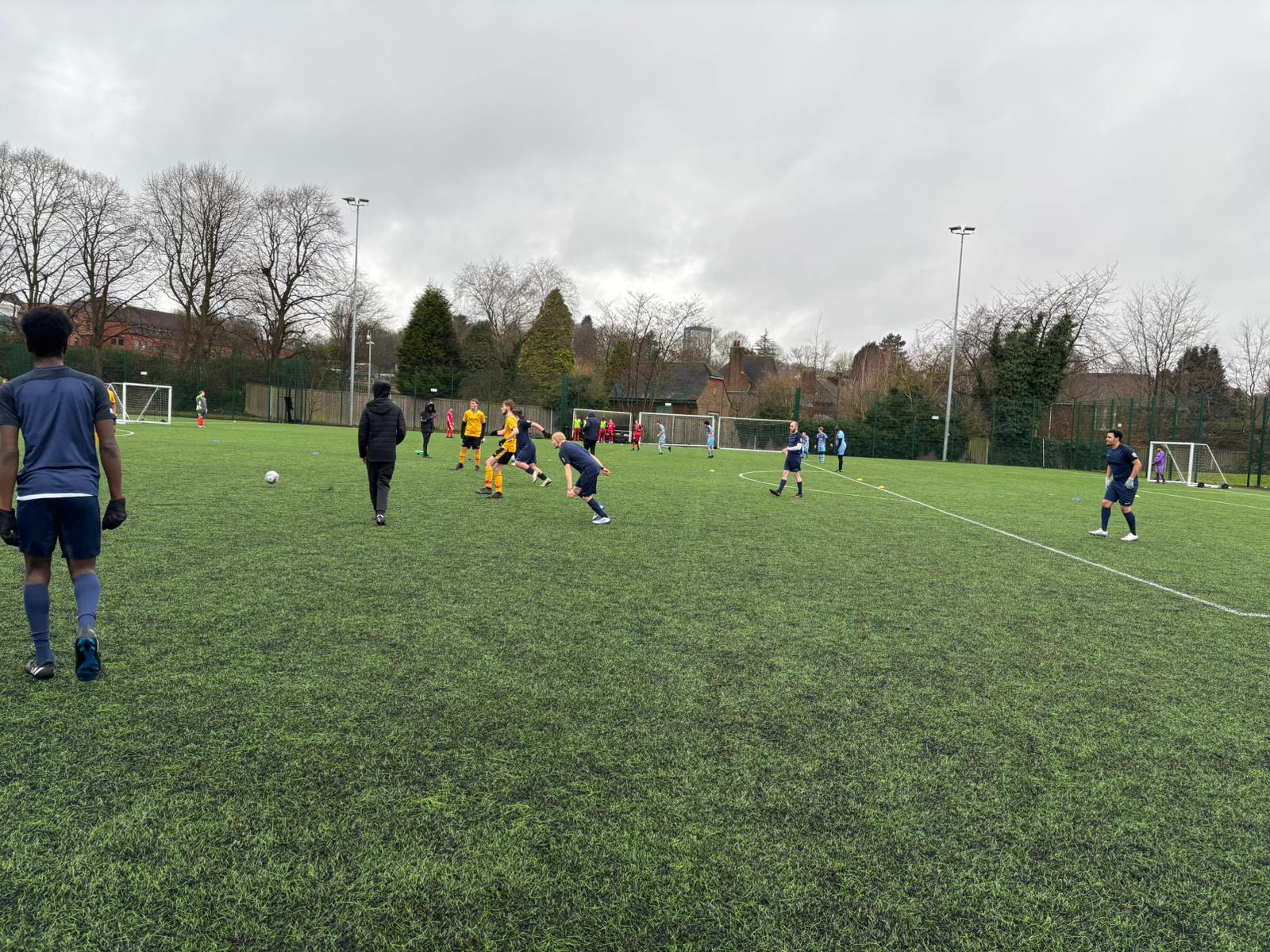 Image of QAC football team playing on a field